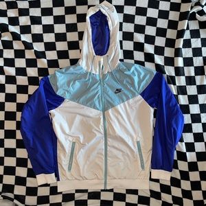 Blue and white Nike hooded windbreaker jacket, size medium